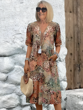 Colette™ | Vibrating Midi Dress
